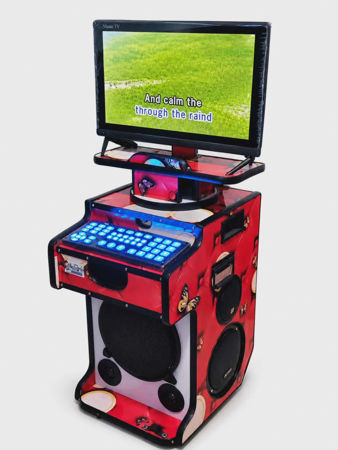 Portable videoke karaoke machine rental Lipa Batangas — built-in screen, blue-lit song keypad, and speakers